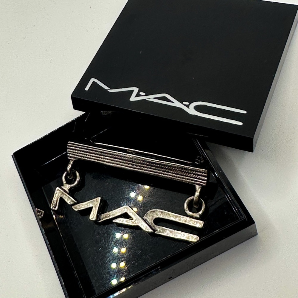 MAC Logo Brooch in Black and Silver